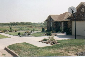 This was my house in Texas - This is what it looked like in summer of 1995. Landscape by Jess