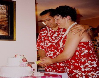 Jess and Linda...cutting their wedding cake during their reception - Sep 4, 2005